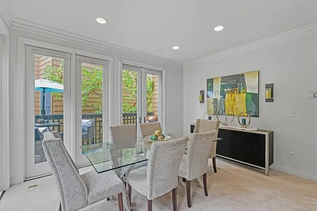 a view of a chair and table in the balcony