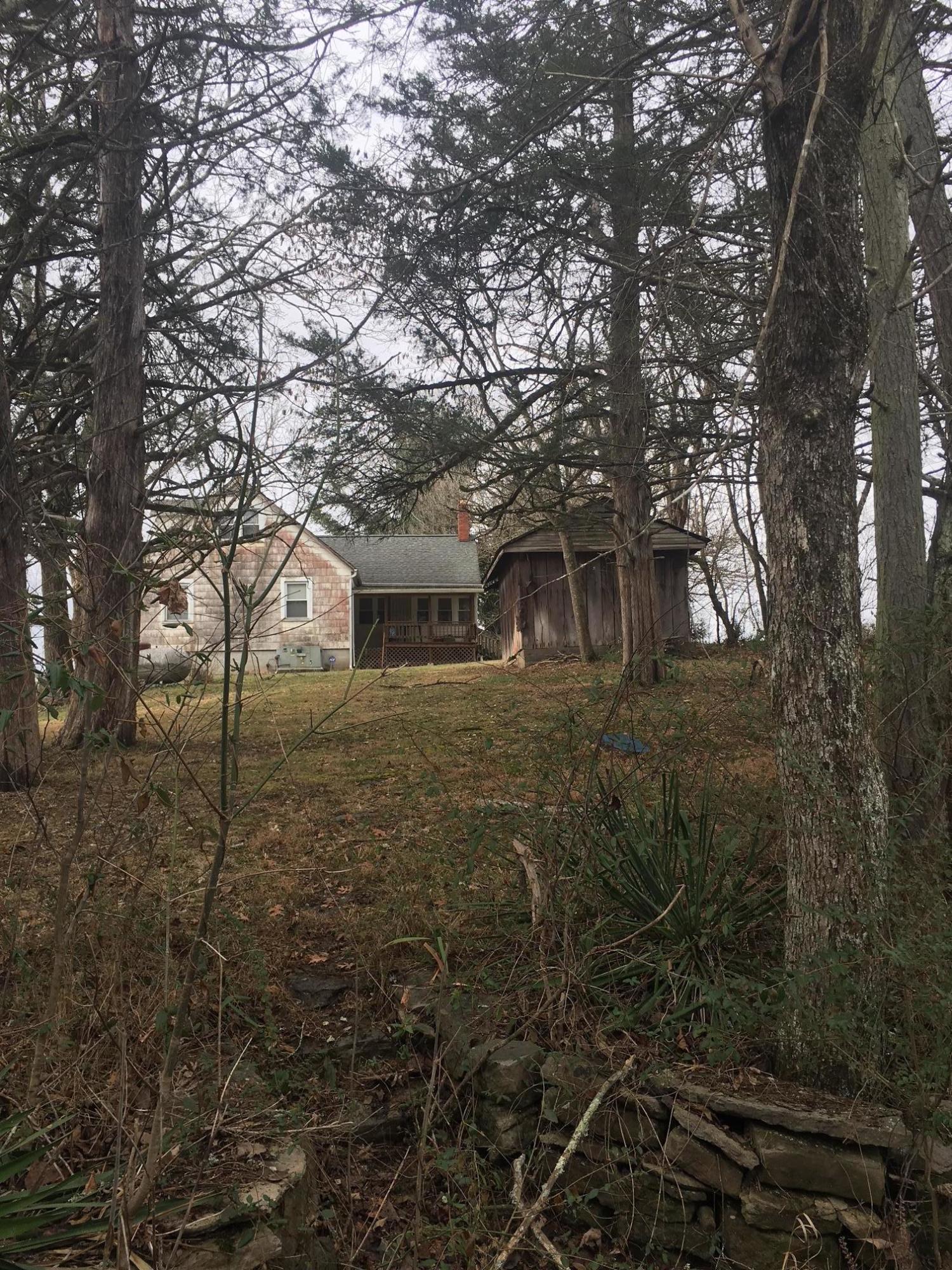 880 Lone Mountain Road Tazewell, TN 37879 - Photo 15 of 16 smoke house and back
