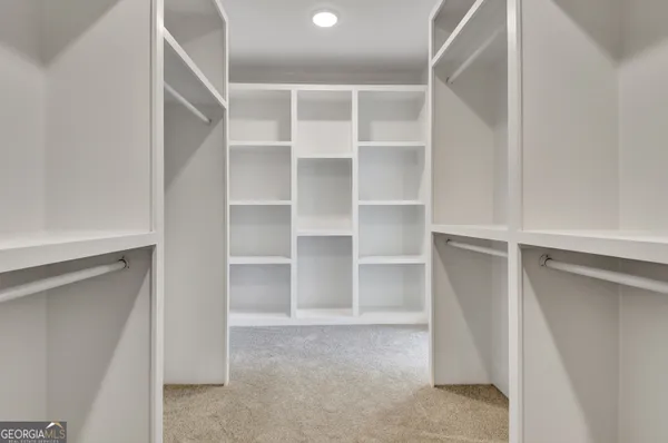 a view of an empty walk in closet
