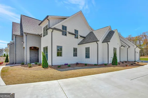 a front view of a house with a tub