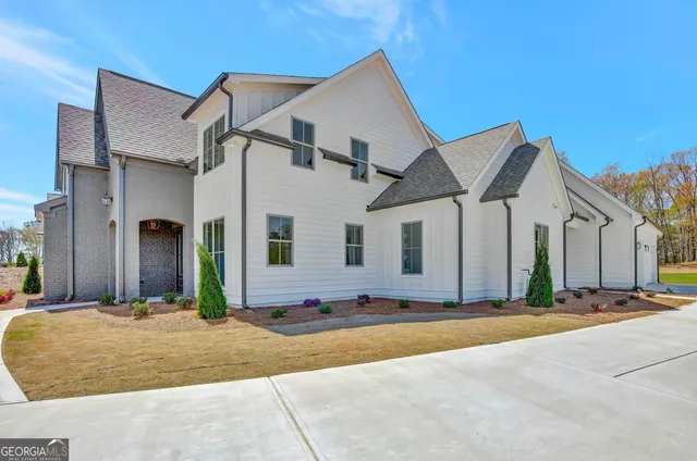 a front view of a house with a tub