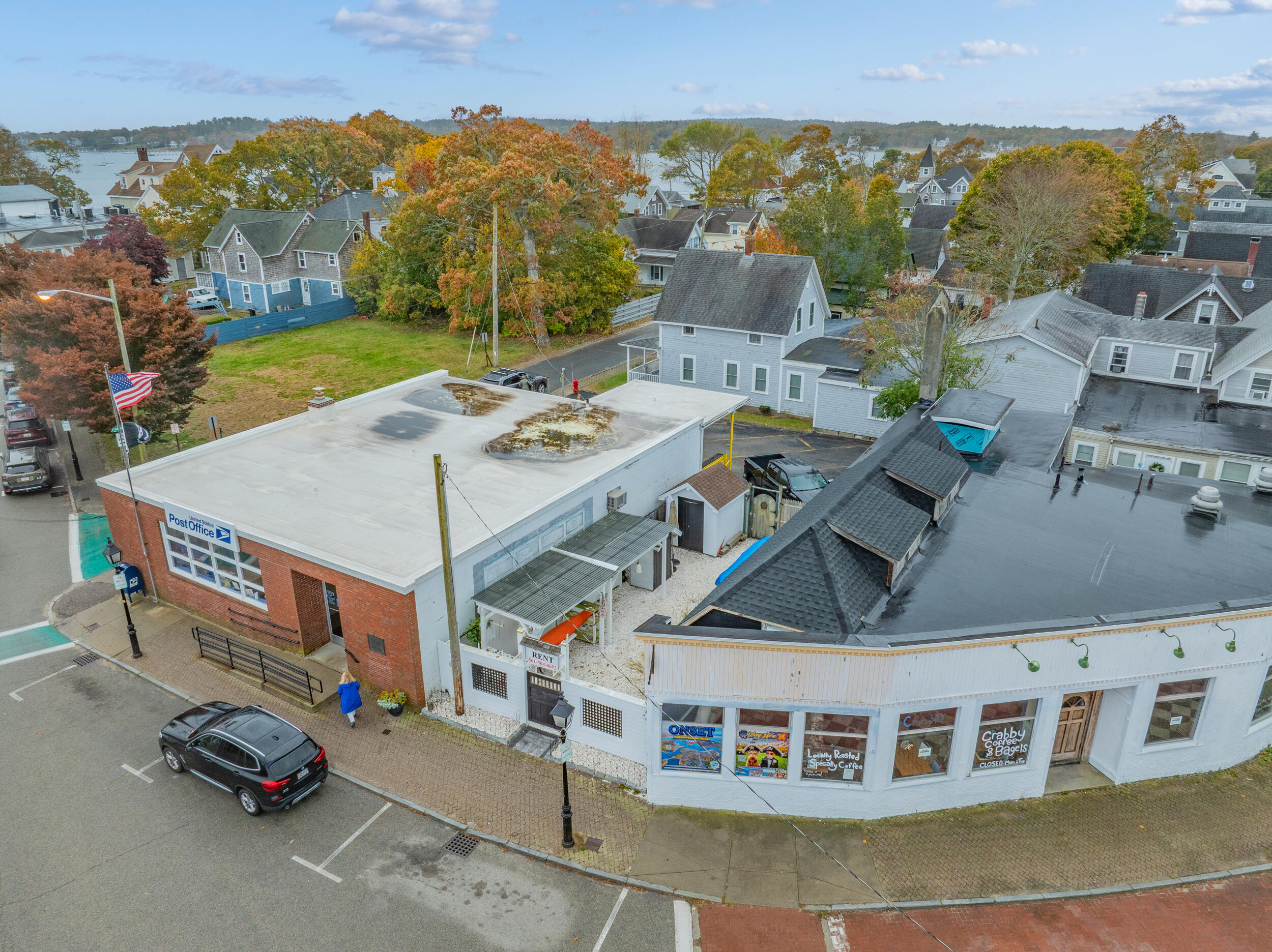 218 Onset Avenue Onset, MA 02558 - Photo 6 of 14 view of a building with cars parked