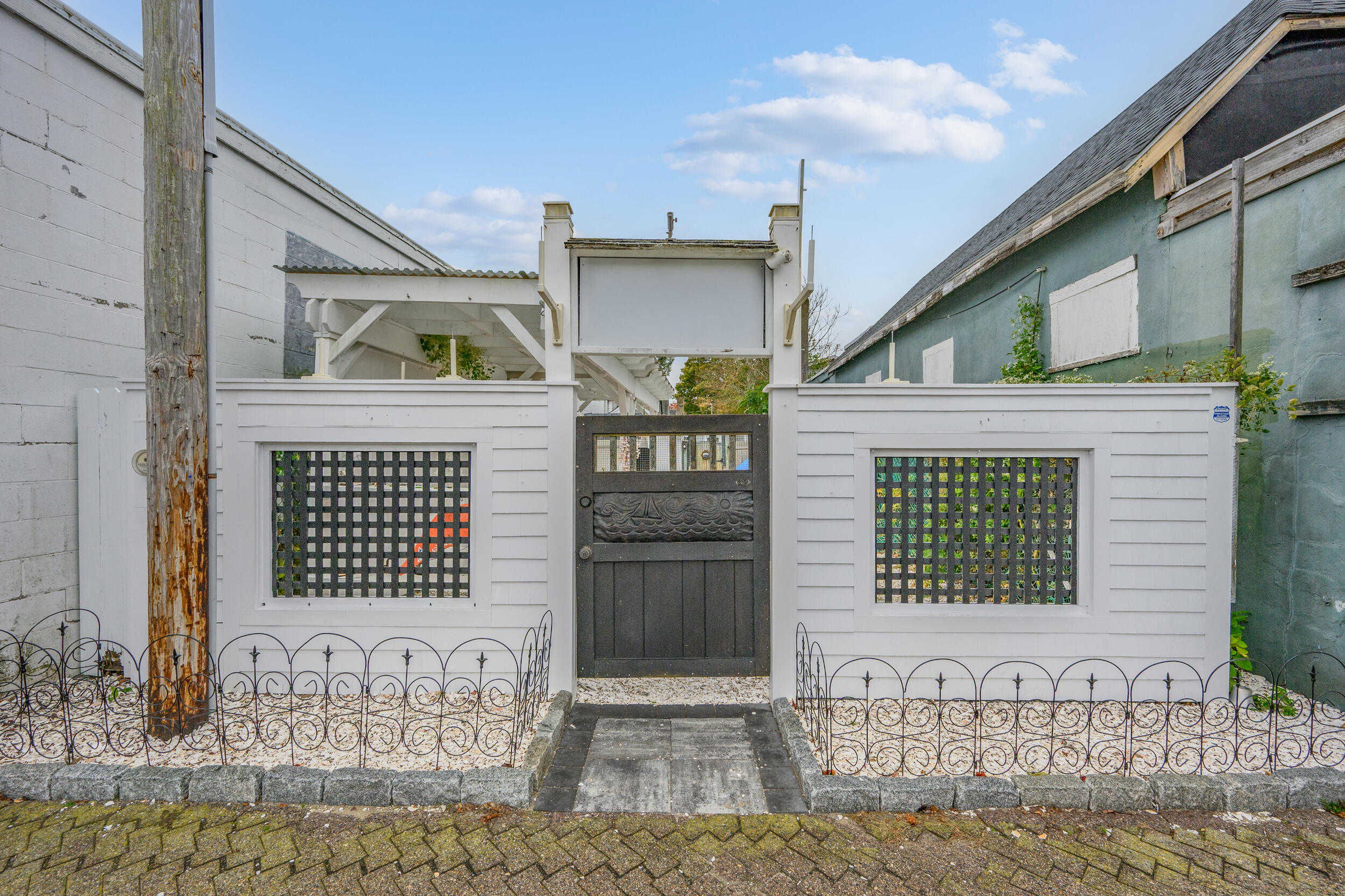 218 Onset Avenue Onset, MA 02558 - Photo 7 of 14 a front view of a house with a garage