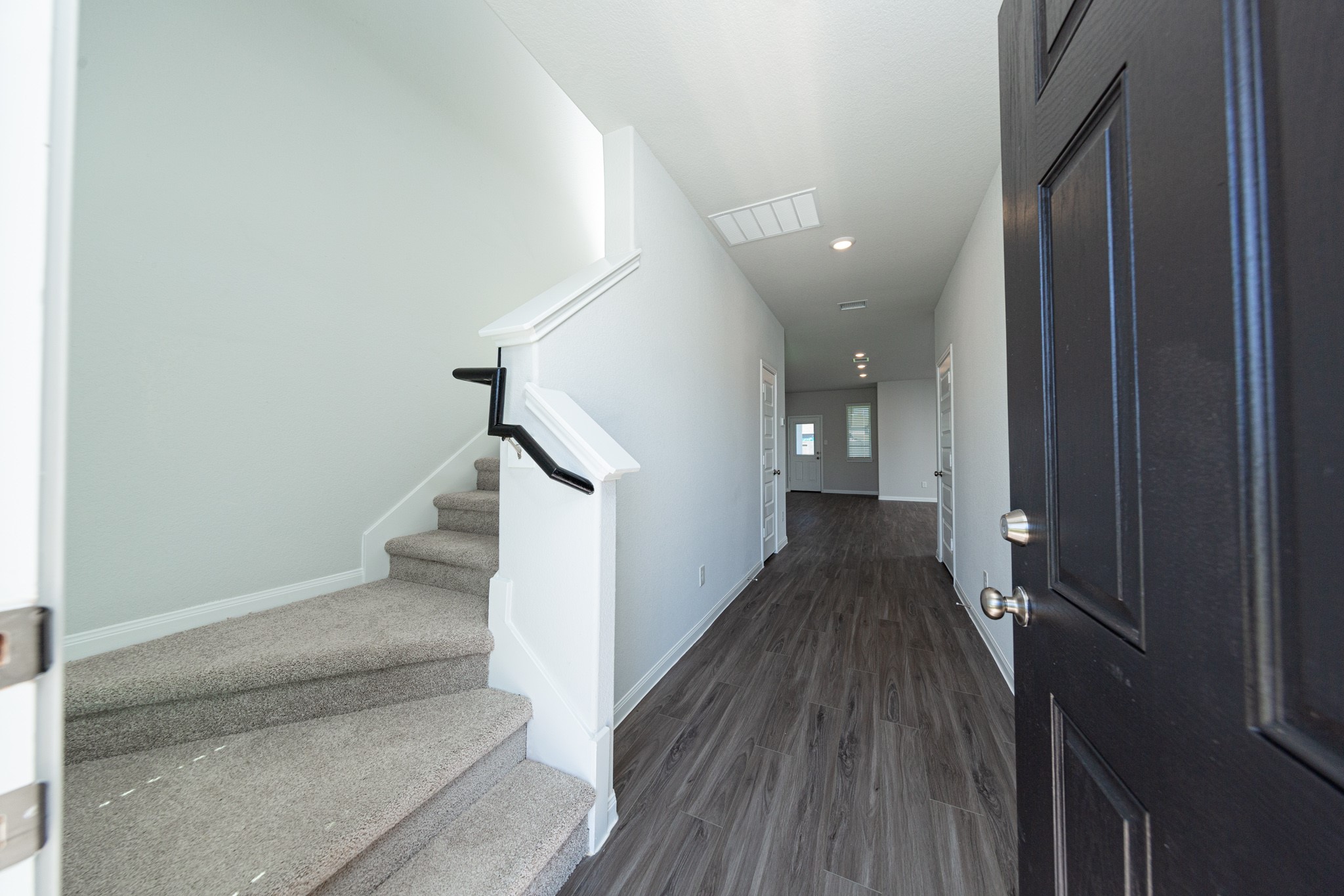 2259 Middle Rdg Drive Conroe, TX 77301 - Photo 3 of 20 a view of entryway and hall with wooden floor
