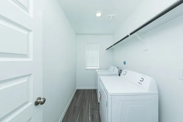 a utility room with dryer and washer