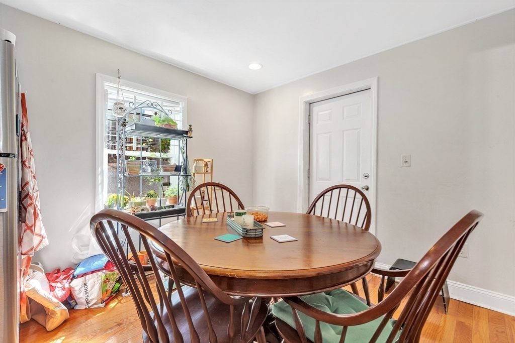 22 Fisher Avenue, Unit 1 Boston, MA 02120 - Photo 7 of 8 a view of a dining room with furniture window and outside view