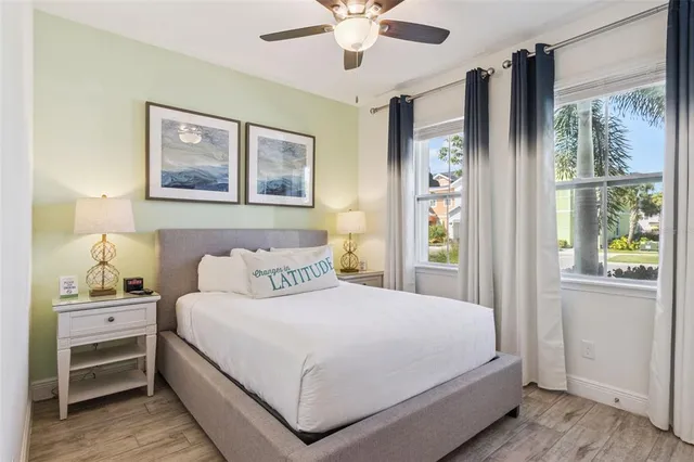 a bedroom with a bed and a table