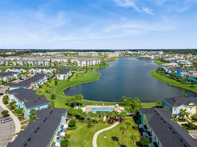 a view of a patio fire pit and chairs