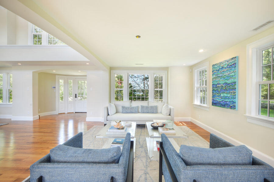 71 Sand Point Osterville, MA 02655 - Photo 15 of 45 a living room with furniture and a large window
