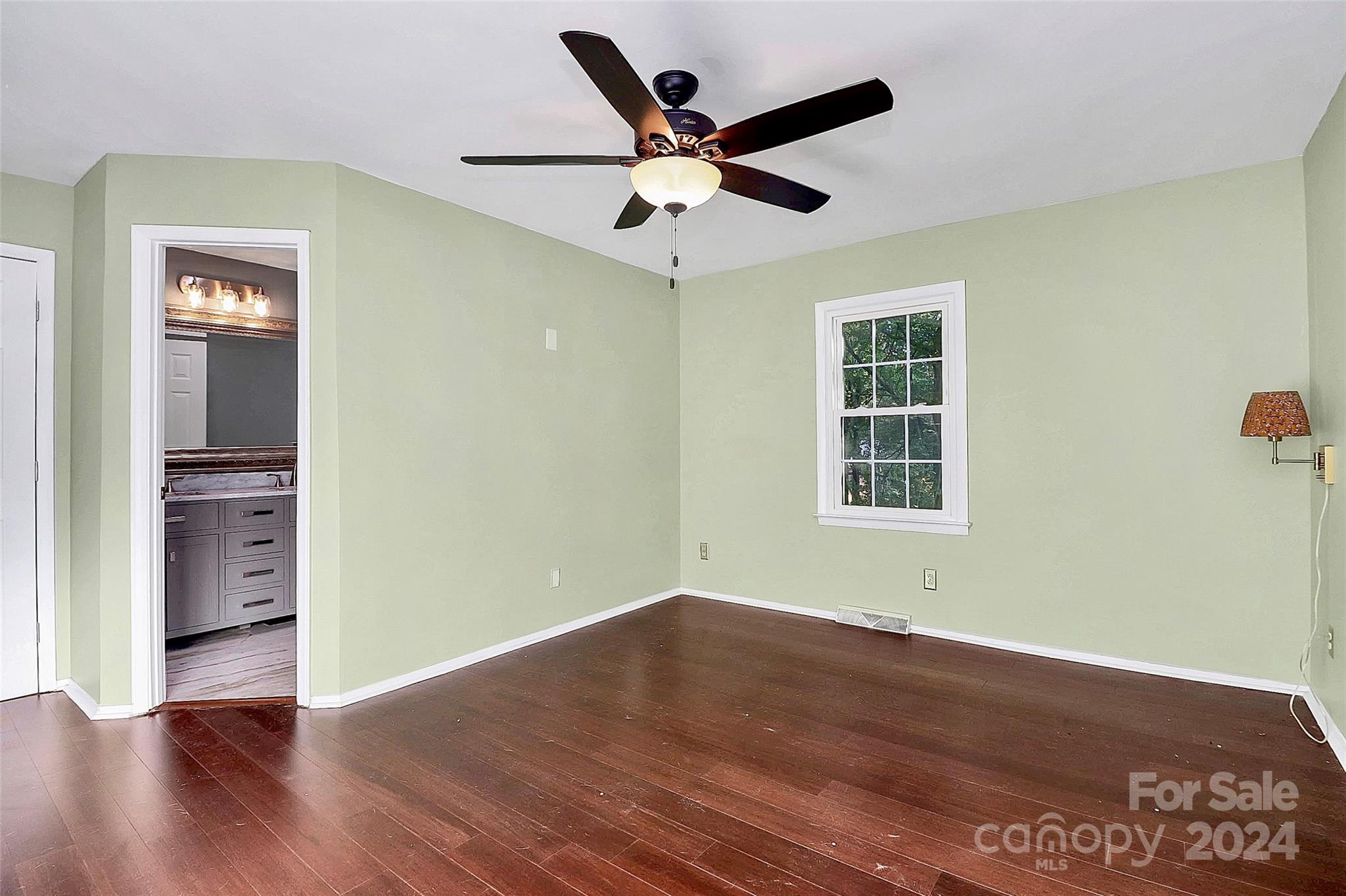 623 Trail Ridge Road Matthews, NC 28105 - Photo 23 of 38 wooden floor in an empty room with a window