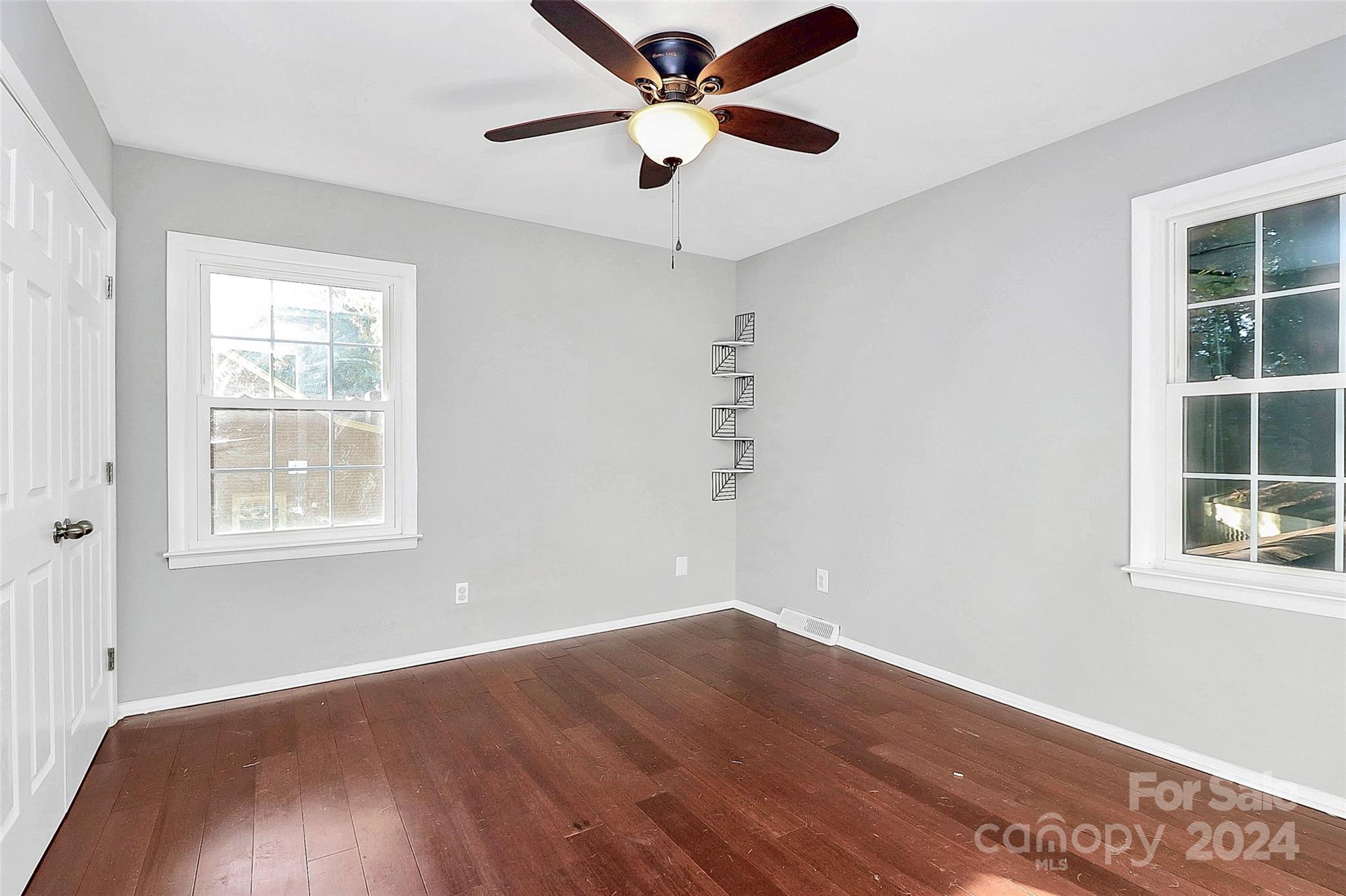 623 Trail Ridge Road Matthews, NC 28105 - Photo 26 of 38 wooden floor in an empty room with a window