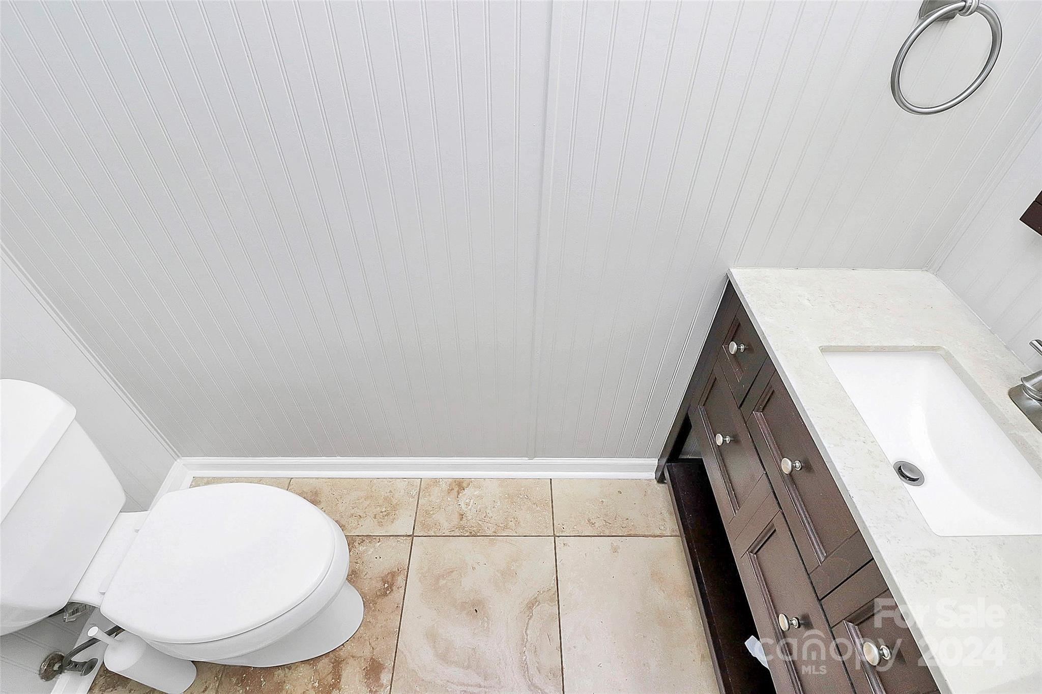 623 Trail Ridge Road Matthews, NC 28105 - Photo 31 of 38 a bathroom with a toilet and a mirror
