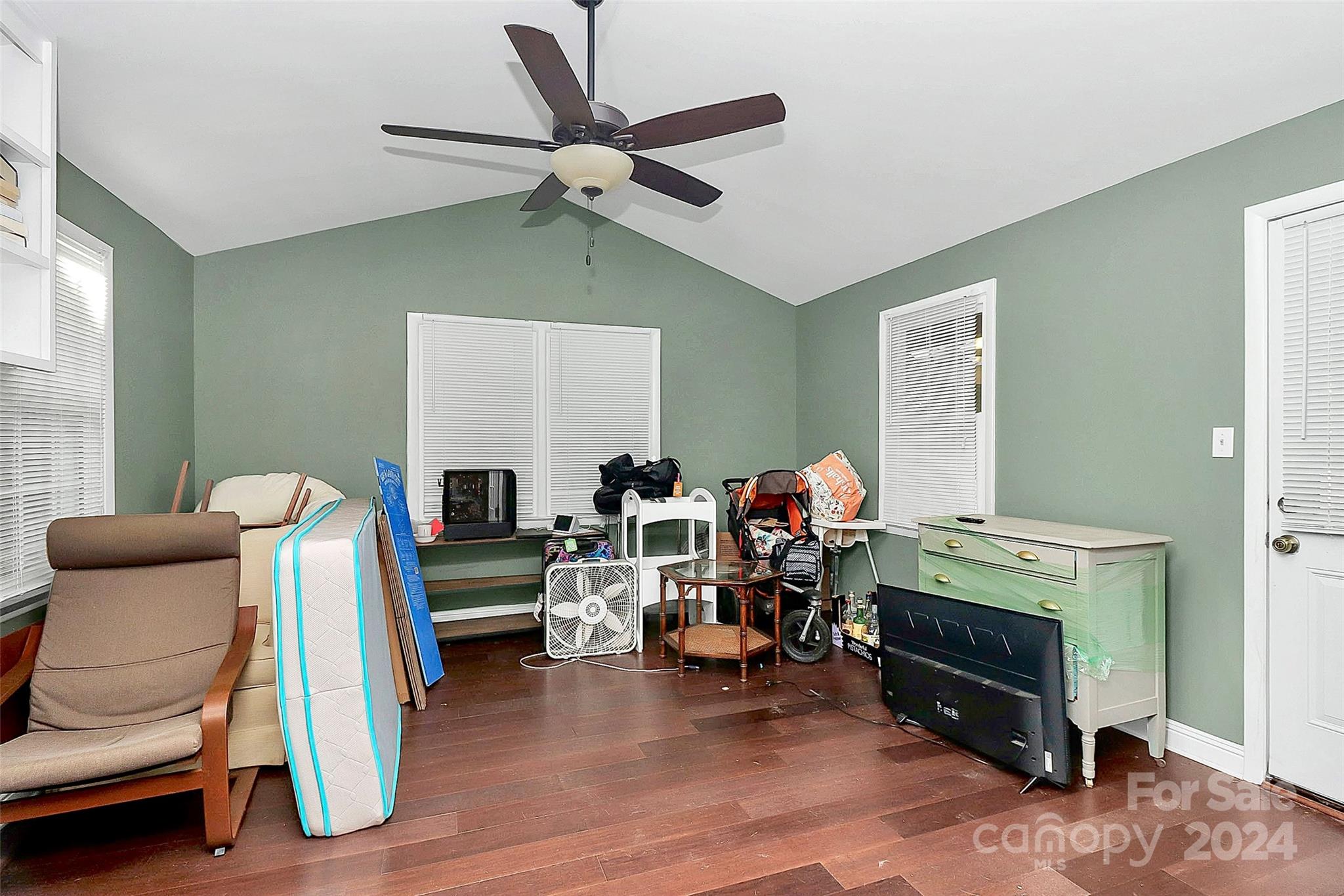 623 Trail Ridge Road Matthews, NC 28105 - Photo 33 of 38 a bedroom with furniture and a wooden floor