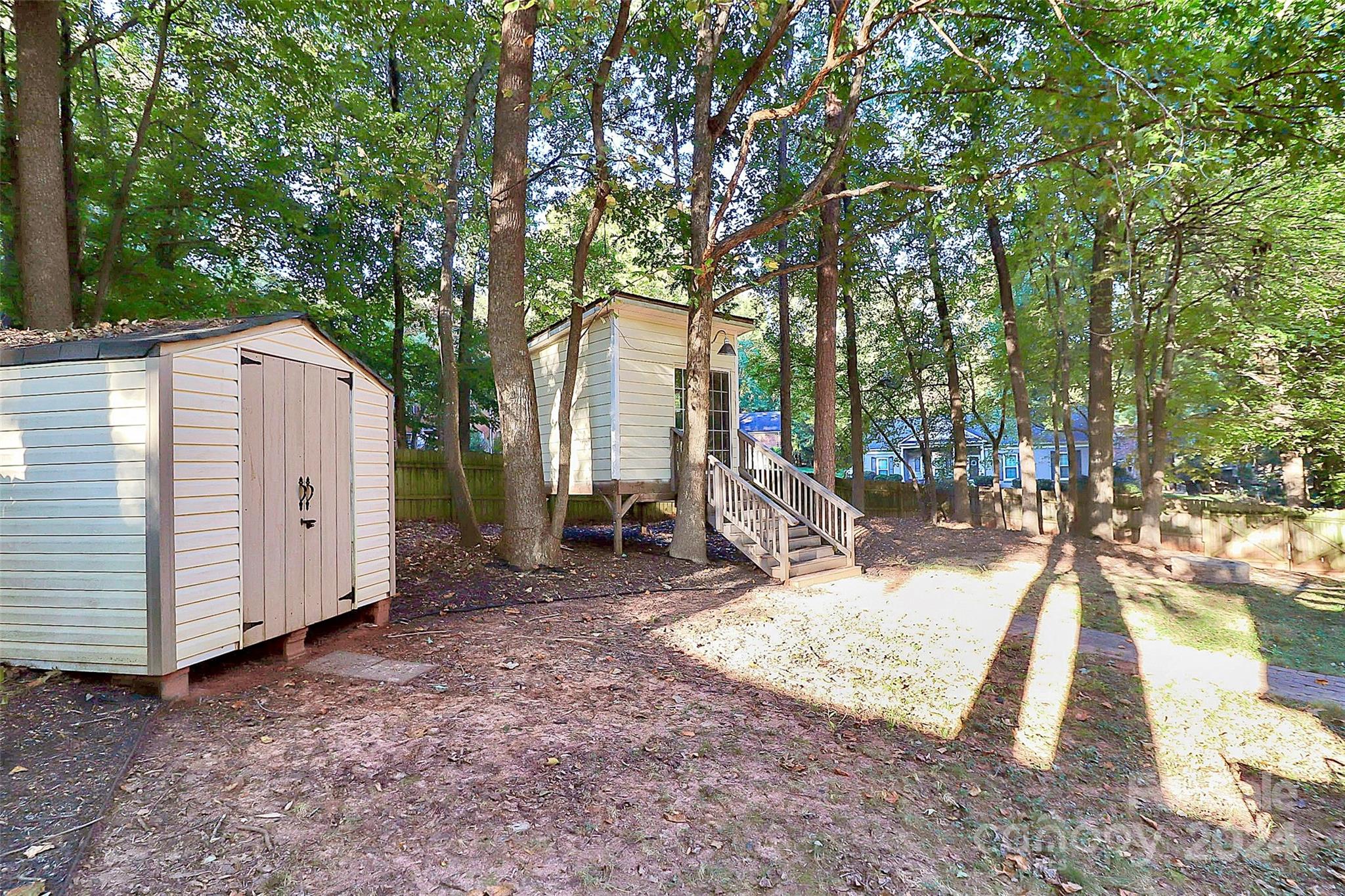623 Trail Ridge Road Matthews, NC 28105 - Photo 34 of 38 a view of a backyard with large tree