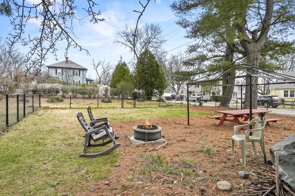 7 Rural Street Worcester, MA 01604 - Photo 5 of 5 a view of a swimming pool with a bench and trees