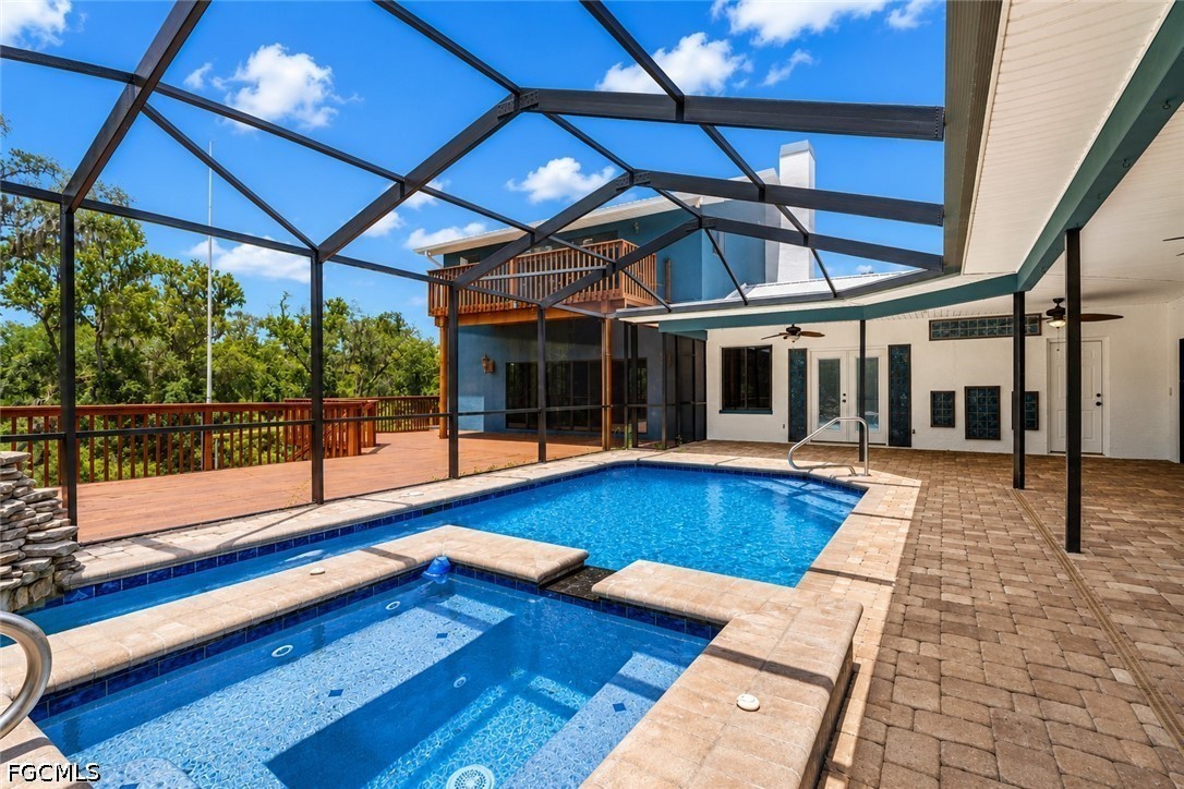 27255 Hickory Hill Road Brooksville, FL 34602 - Photo 14 of 50 a view of swimming pool with seating area