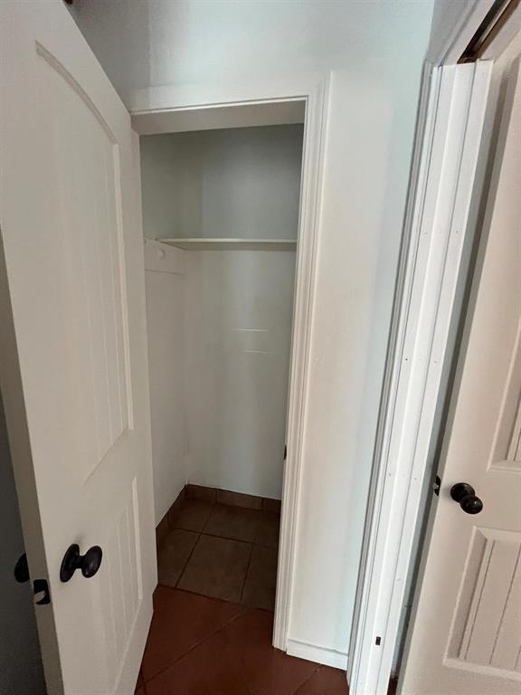 640 Harbor Drive Azle, TX 76020 - Photo 18 of 33 a view of a closet with wooden floor
