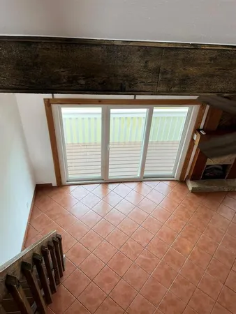 a view of a room with an empty space