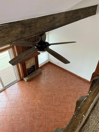 a view of a room with racks on the wall