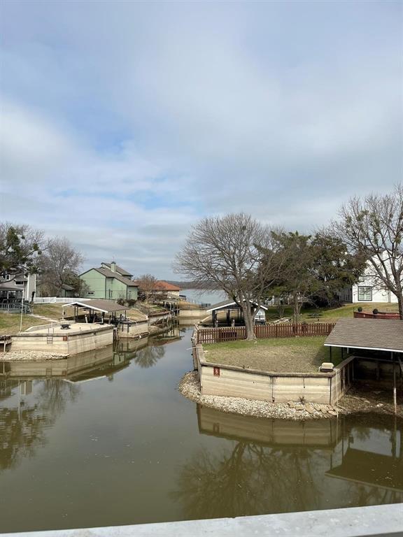 640 Harbor Drive Azle, TX 76020 - Photo 30 of 33 a view of a lake with houses