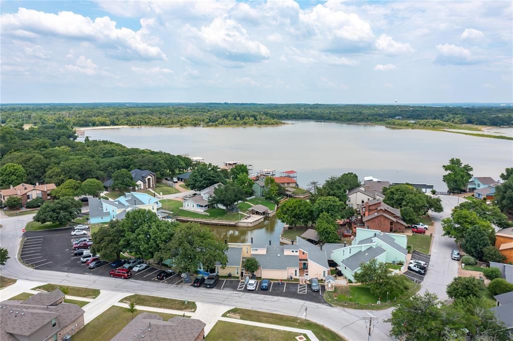 640 Harbor Drive Azle, TX 76020 - Photo 32 of 33 an aerial view of a house with outdoor space and lake view in back
