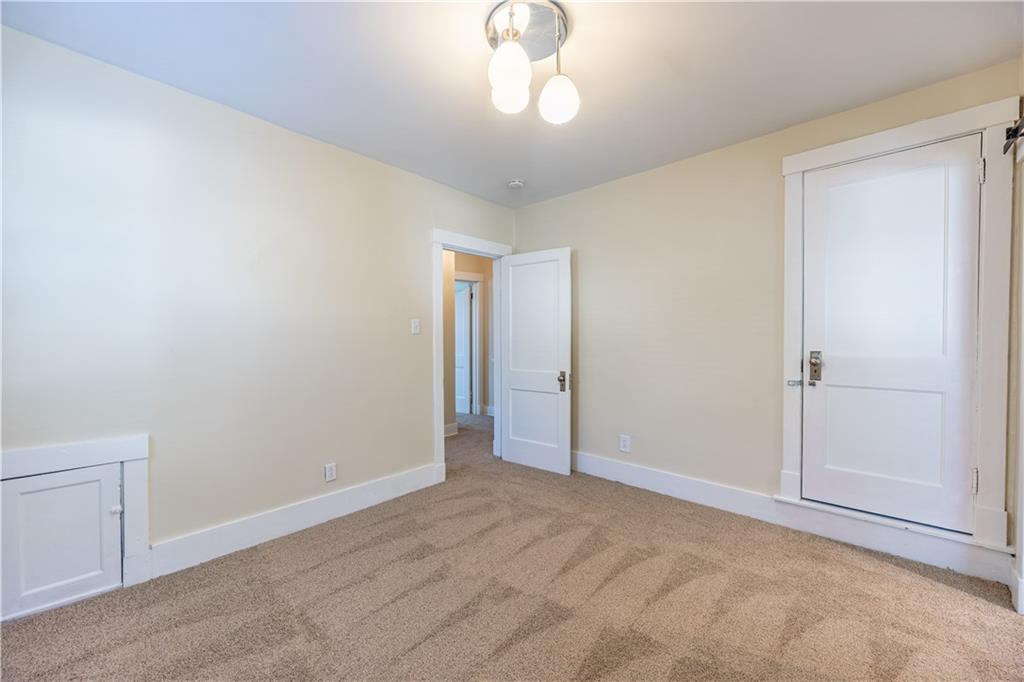1727 Morningside Avenue Pittsburgh, PA 15206 - Photo 10 of 16 a view of an empty room with a window