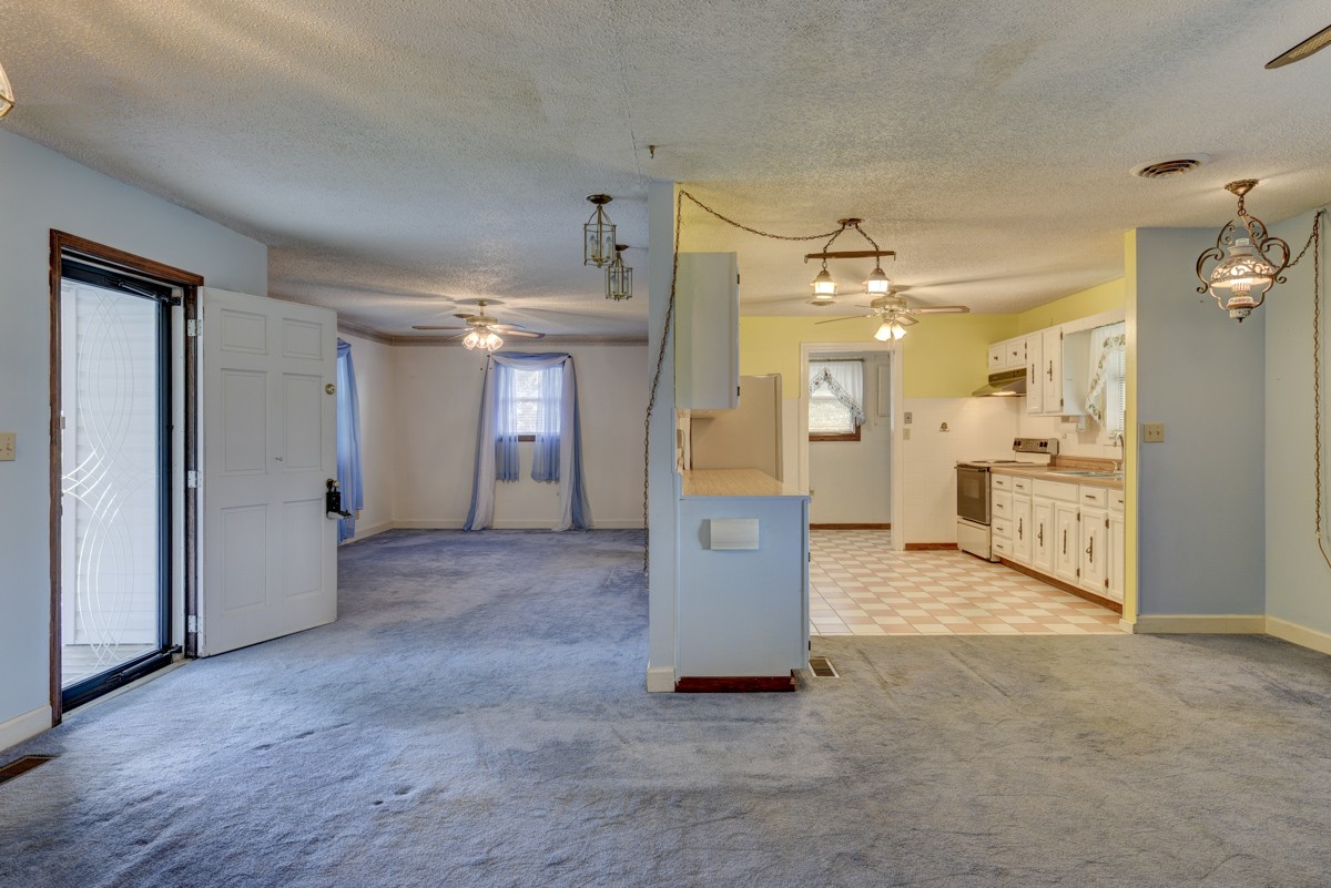 3945 Mitchell Road Lebanon, TN 37087 - Photo 15 of 41 a view of a room with a kitchen and a sink