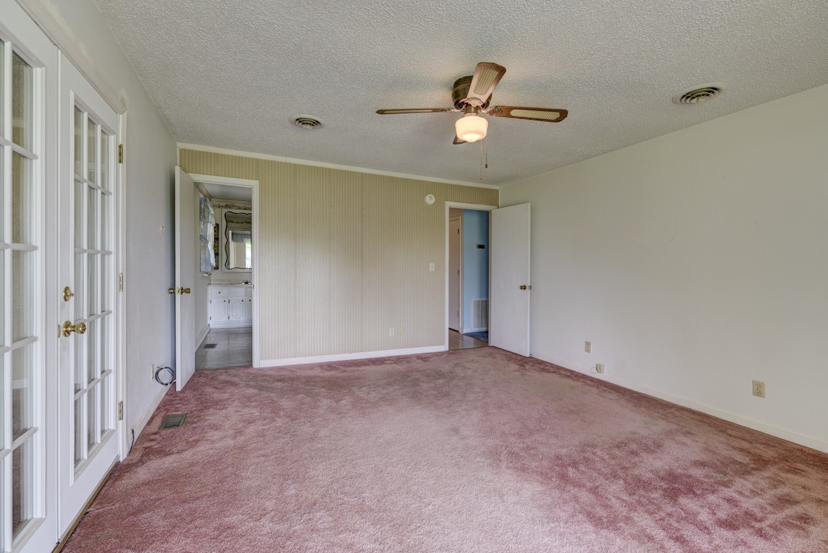 3945 Mitchell Road Lebanon, TN 37087 - Photo 20 of 41 a view of an empty room with a chandelier fan