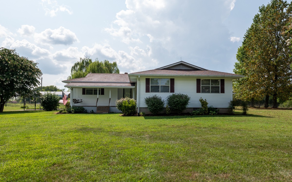 3945 Mitchell Road Lebanon, TN 37087 - Photo 3 of 41 a front view of a house with garden