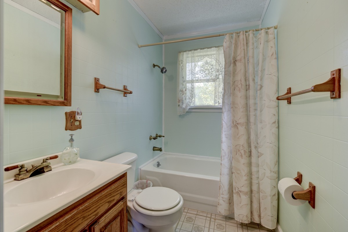 3945 Mitchell Road Lebanon, TN 37087 - Photo 29 of 41 a bathroom with a sink toilet and shower