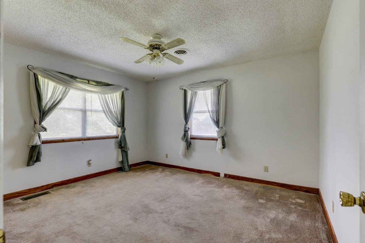 3945 Mitchell Road Lebanon, TN 37087 - Photo 31 of 41 an empty room with windows and fan