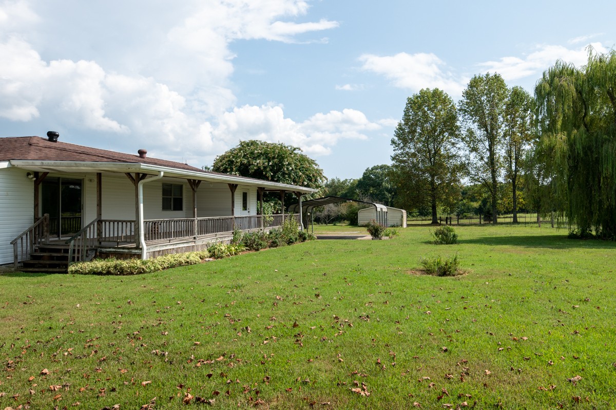 3945 Mitchell Road Lebanon, TN 37087 - Photo 7 of 41 a view of a house with a backyard