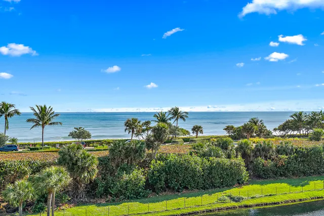 a view of a yard with an outdoor space and seating