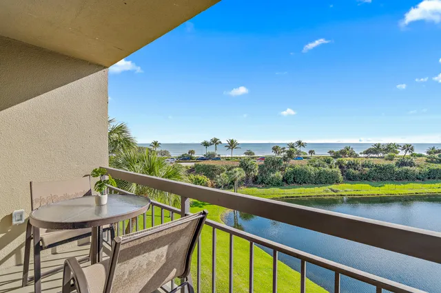 a view of a balcony with lake view