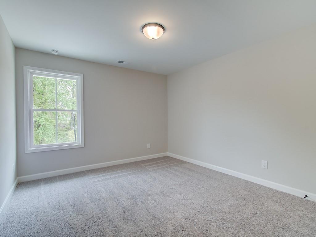 341 Colsen Drive Acworth, GA 30102 - Photo 22 of 36 an empty room with a window