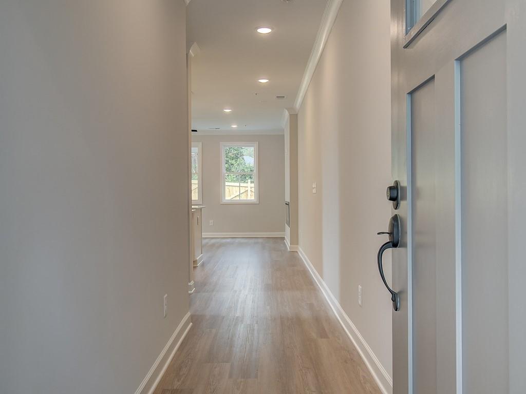 341 Colsen Drive Acworth, GA 30102 - Photo 7 of 36 a view of hallway with wooden floor