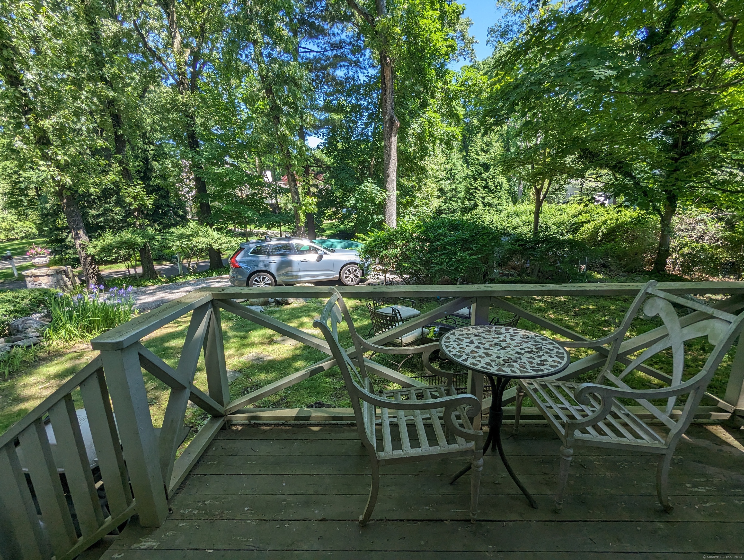 3 Wild Rose Lane, Unit COTTAGE Darien, CT 06820 - Photo 15 of 16 a view of a chairs and table in the outdoor