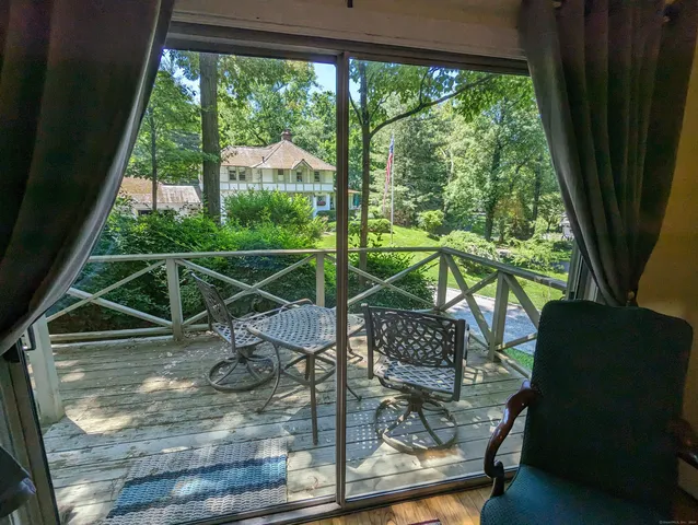 a view of trees and patio