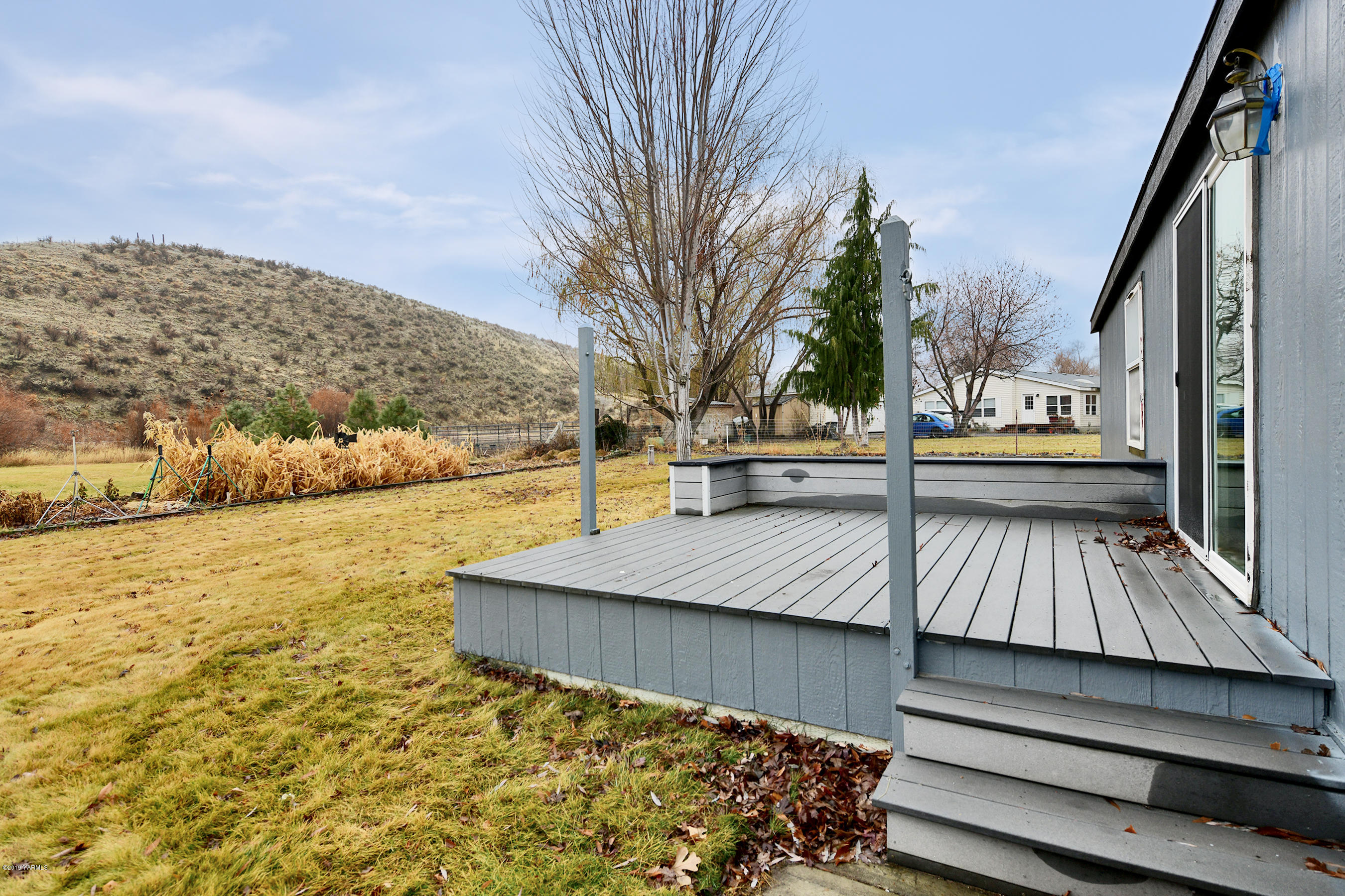 1251 Stone Road Yakima, WA 98908 - Photo 13 of 17 a view of outdoor space with garden and deck