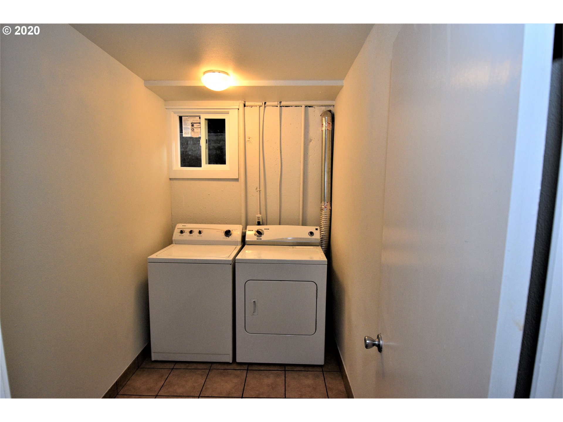 1506 Southwest Broadway Drive Portland, OR 97201 - Photo 18 of 18 a utility room with dryer and washer