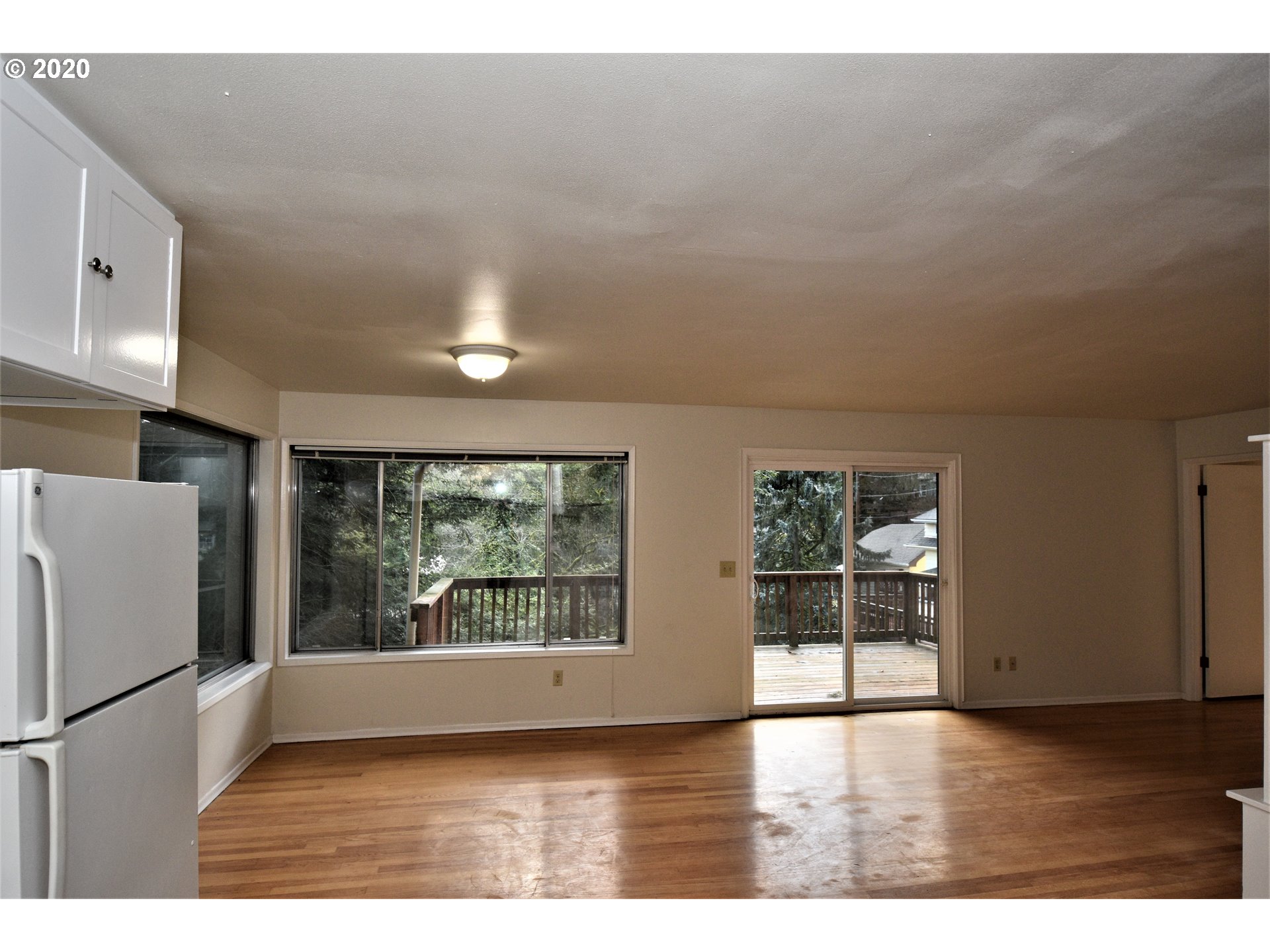 1506 Southwest Broadway Drive Portland, OR 97201 - Photo 3 of 18 a view of an empty room with a window