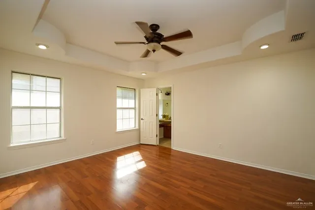 a kitchen with granite countertop a sink and a stove top oven