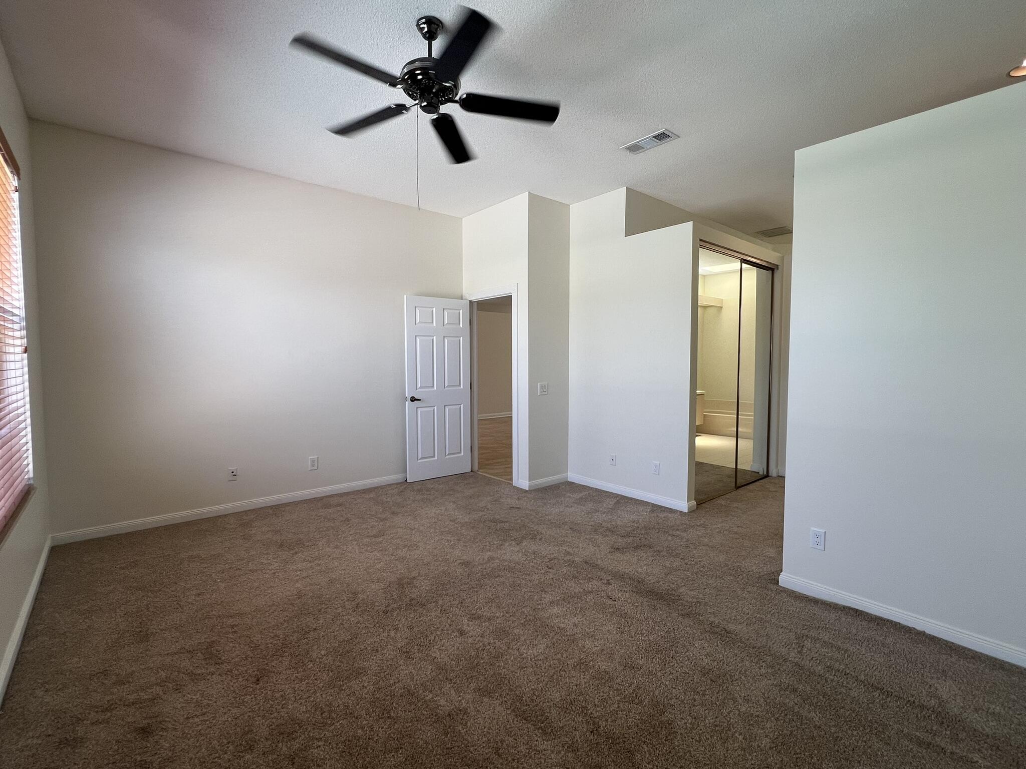 244 Hampton Place Jupiter, FL 33458 - Photo 14 of 31 Master Bedroom