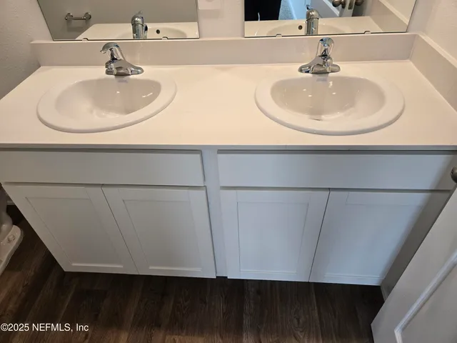 a bathroom with a shower and toilet