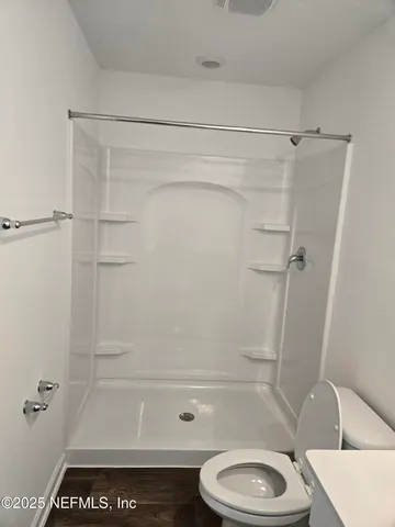 a view of a room with racks on the wall