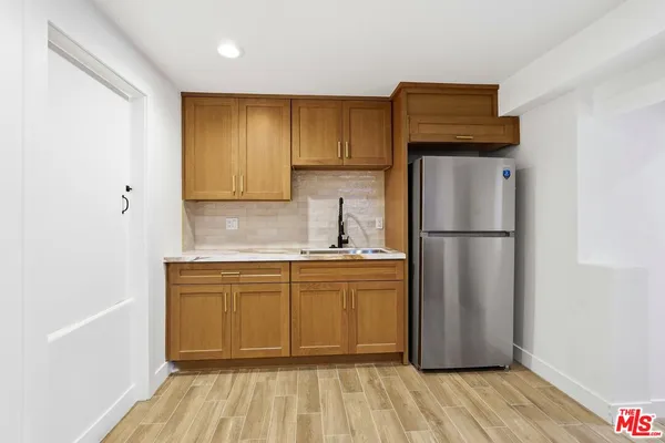 a view of balcony with wooden floor