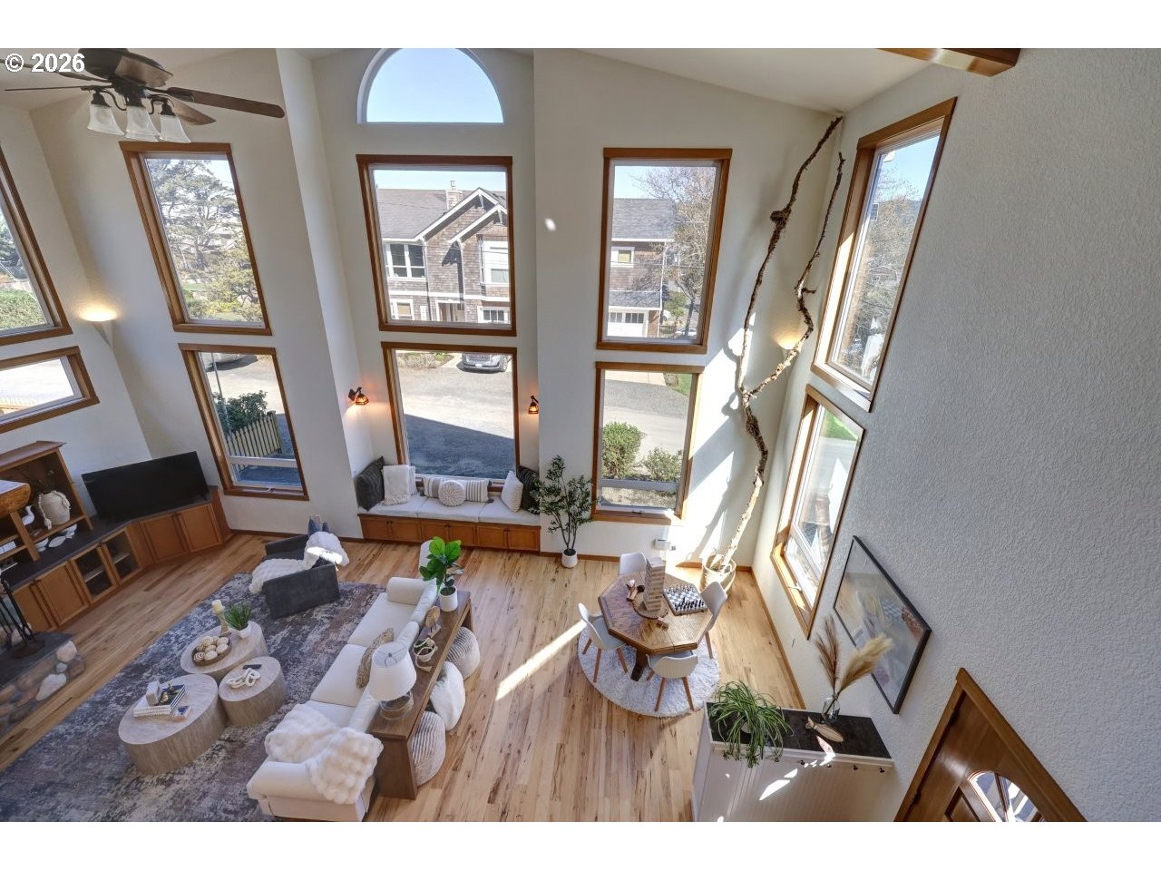 163 West 1st Street Cannon Beach, OR 97110 - Photo 15 of 42 a living room with furniture and a fireplace