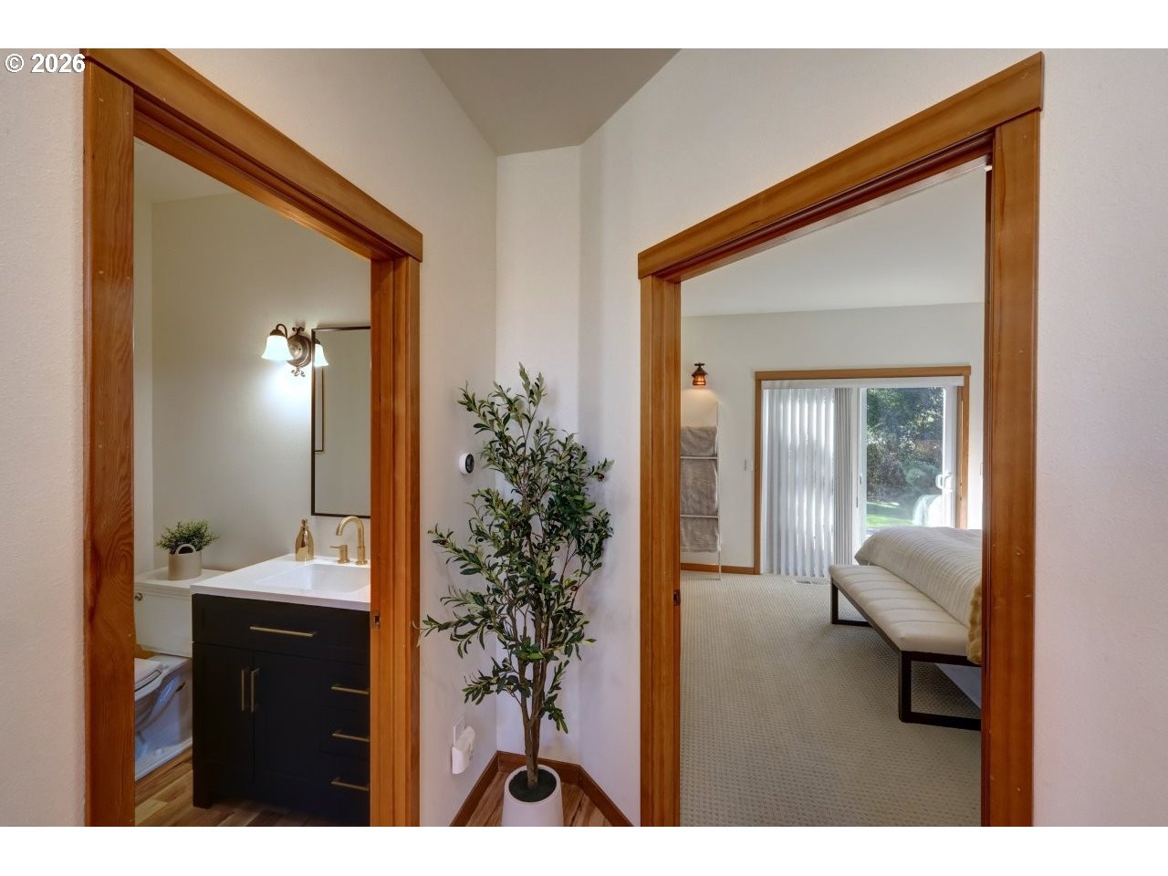 163 West 1st Street Cannon Beach, OR 97110 - Photo 16 of 42 a bathroom with a sink and a mirror