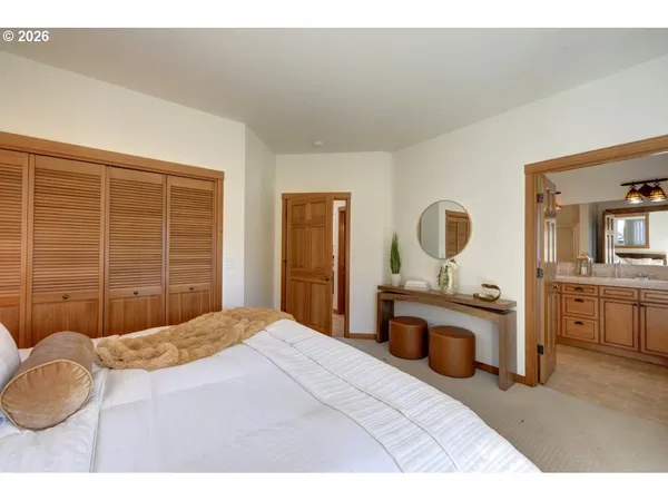 a bathroom with a sink a light fixture and a mirror