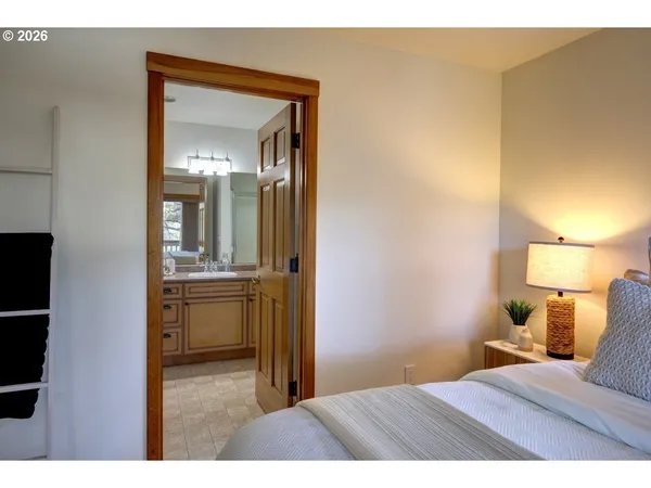 a bathroom with a sink double vanity and a mirror